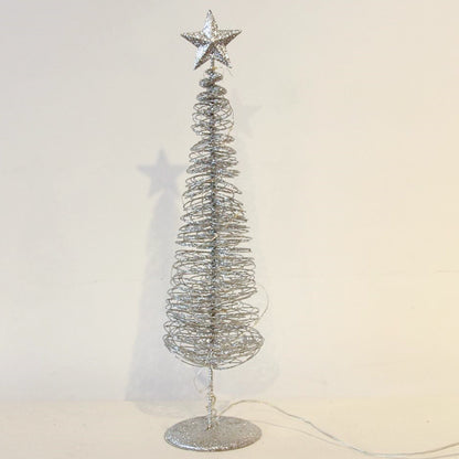 Silver Christmas tree with star on top against a white background
