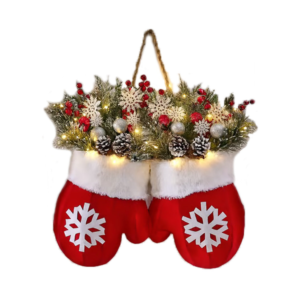 Decorative Christmas stocking with mittens, lights, and ornaments on a white background