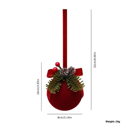Red Christmas ornament with greenery and measurements on a white background