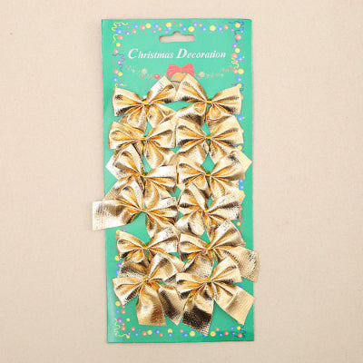 Pack of gold decorative bows on a green card with 'Christmas Decoration' text.