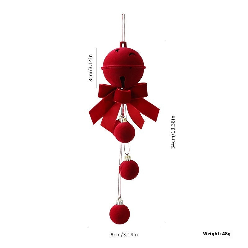 Red decorative bell with a bow and three hanging balls, shown with measurements on a white background.