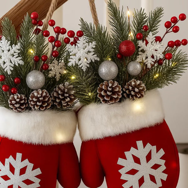 Red Christmas stockings with white snowflake patterns, filled with greenery, red berries, and pinecones.
